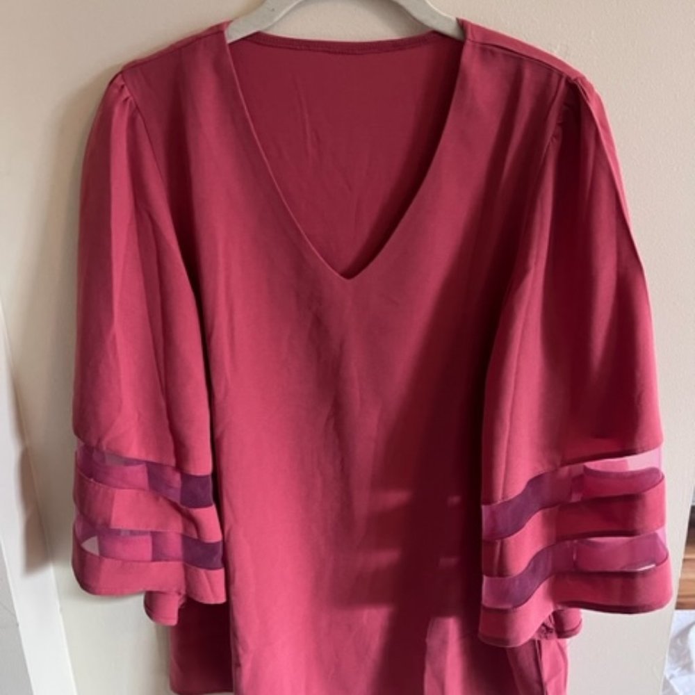 Salmon pink blouse